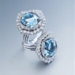 Anillos de oro blanco, diamantes y aguamarina.
